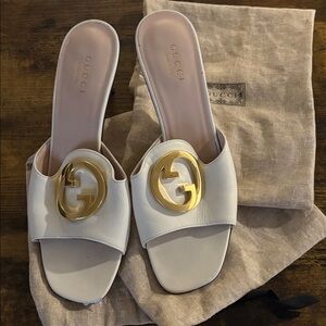Gucci Women's White Mules with Gold Emblem